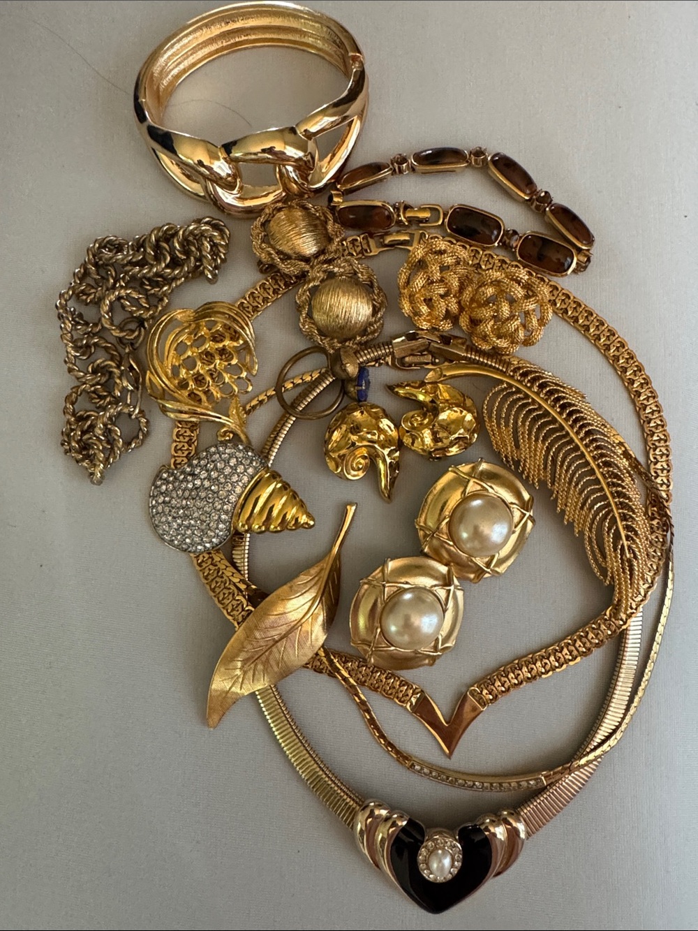 15 Piece Gold Costume Jewelry Lot with signed Monet, Napier, Lisner and others.